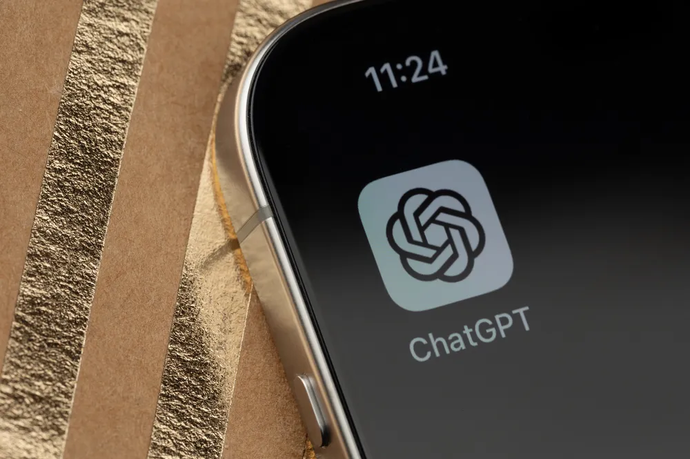 Close-up of a smartphone home screen showing the ChatGPT app icon, representing an ai personal assistant for everyday questions and tasks